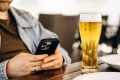Wetherspoons bans customers playing music from phones in pubs