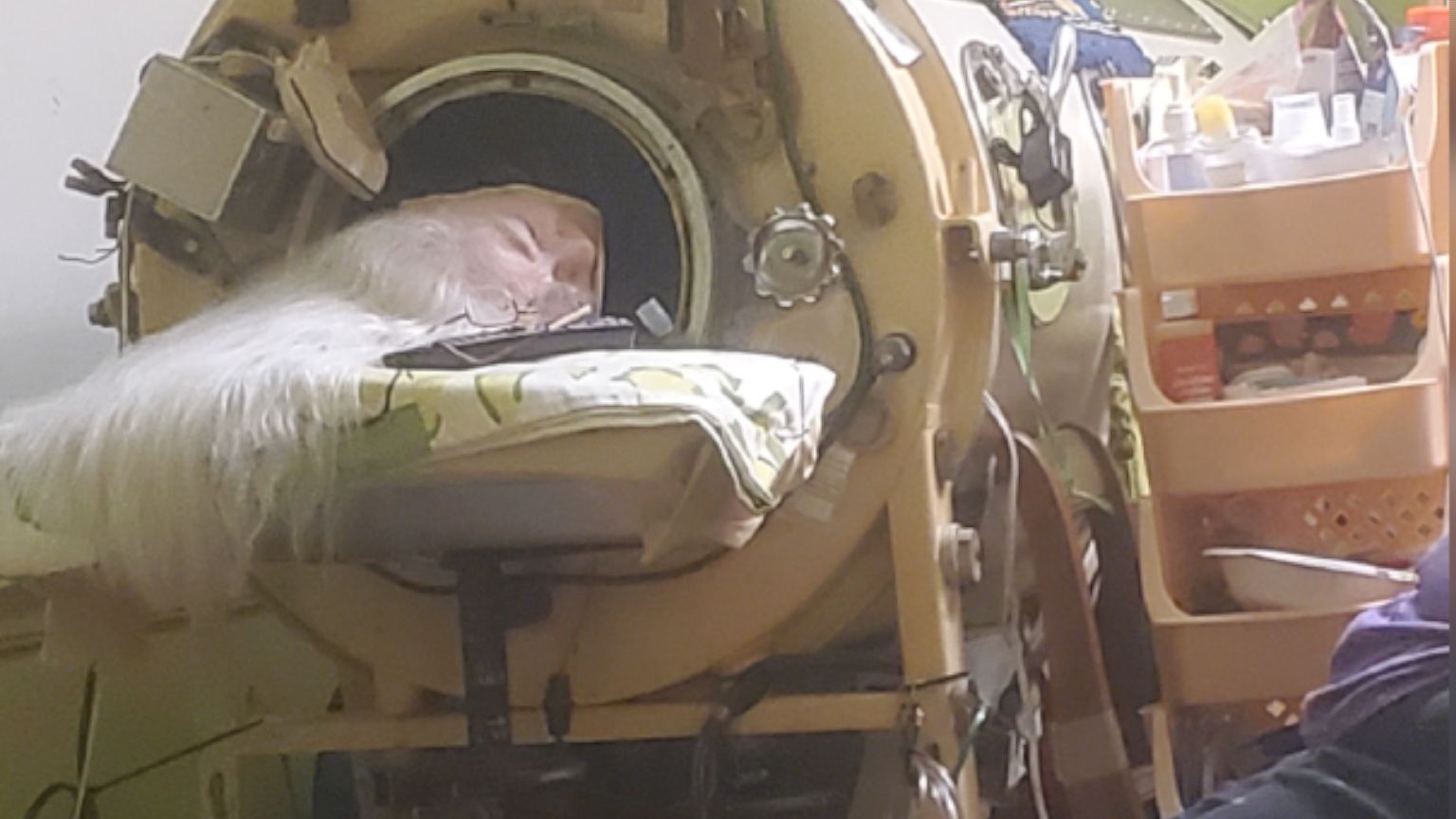 Hours each day in an iron lung kept her breathing, her will to live kept her alive