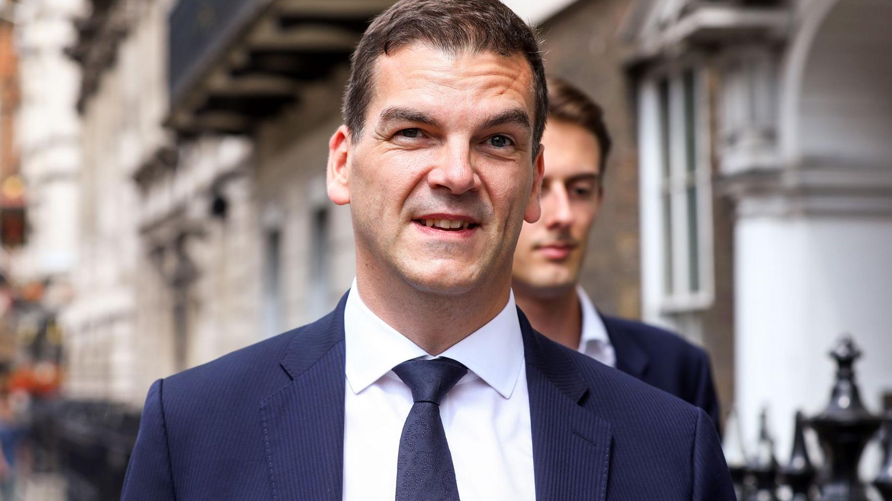 Former top official Robbins takes legal action over sacking