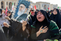 Iran’s supreme leader absent as senior officials attend ayatollah’s funeral
