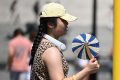 UK heatwave spreads further north and west as temperatures continue to climb