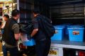 Five arrested after Hong Kong police raid independent bookshops