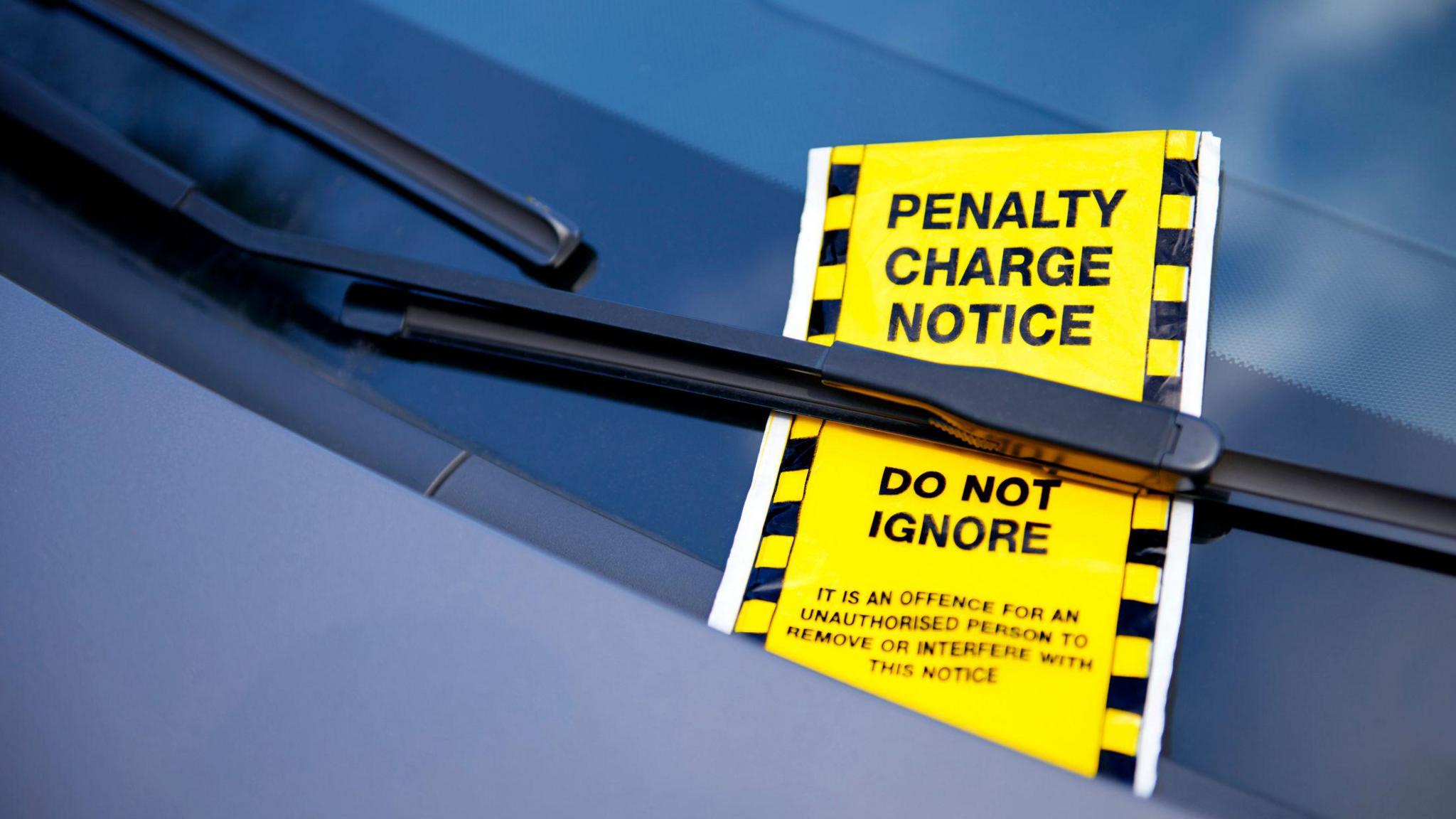 Investigation into parking tickets for drivers queuing at petrol stations