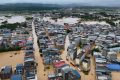 ‘The water just came so fast’: Typhoon triggers floods and rare tornadoes in China