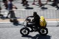 Heatwave prompts Italy’s delivery riders to strike for extra rights