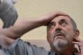 One anti-war critic fined, another held as Russia clamps down on opponents